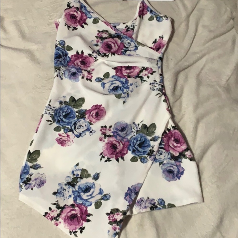 A white romper/dress with pink and blue roses 💗